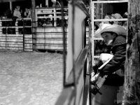 Derick Costa Jr., 10,  ties the spurs and tightens the chaps before his first ride at the final event in the New England Rodeo championship in Norton, MA.